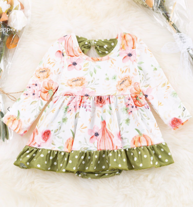 FLORAL PRINTED INFANT BLOOMER DRESS.